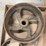 assorted-collection-of-belts,-pulleys,-and-metal-parts-image-2
