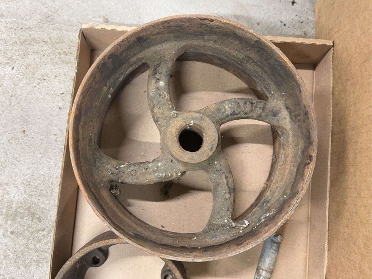 assorted-collection-of-belts,-pulleys,-and-metal-parts-image-2