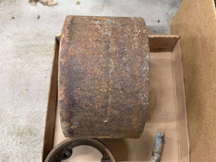 assorted-collection-of-belts,-pulleys,-and-metal-parts-image-3