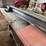 #3593-•-wooden-work-bench-with-assortment-of-sheet-metal-siding-image-7