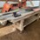 #3593-•-wooden-work-bench-with-assortment-of-sheet-metal-siding-image-1
