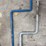 assorted-collection-of-belts,-pulleys,-and-metal-parts-image-8