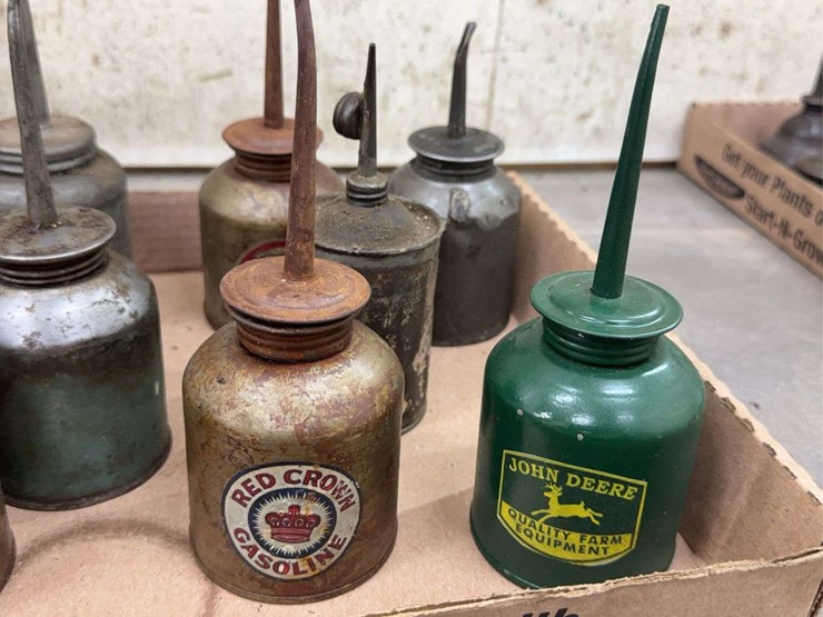oil-can-assortment-with-advertising-graphics-image-9