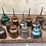 oil-can-assortment-with-advertising-graphics-image-11