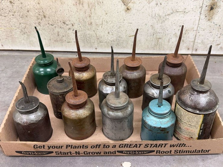 oil-can-assortment-with-advertising-graphics-image-11