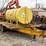 appoximately-1,000-gallon-fuel-tank-w/-fill-rite20-gpm-12v-pumpmounted-on-ferree-3-axle-trailer-image-1