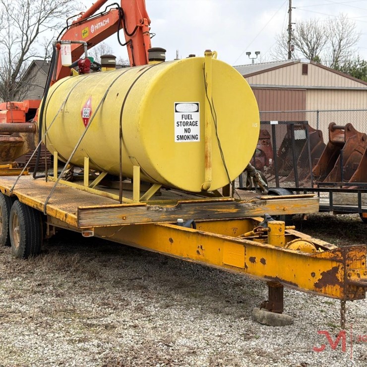APPOXIMATELY 1,000 GALLON FUEL TANK W/ FILL-RITE20 GPM 12V PUMPMOUNTED ON FERREE 3 AXLE TRAILER