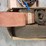 assorted-collection-of-belts,-pulleys,-and-metal-parts-image-9