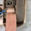assorted-collection-of-belts,-pulleys,-and-metal-parts-image-10