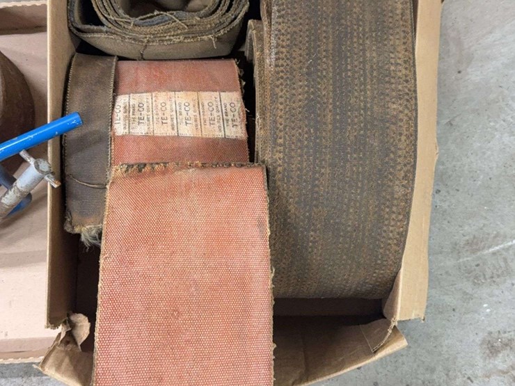 assorted-collection-of-belts,-pulleys,-and-metal-parts-image-10