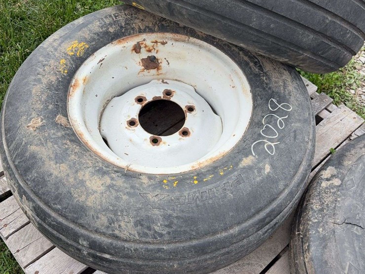 2-implement-tires-11l-15-on-6-bolt-rims,-1-implement-tire-8.5l-14-on-6-bolt-rim-image-3