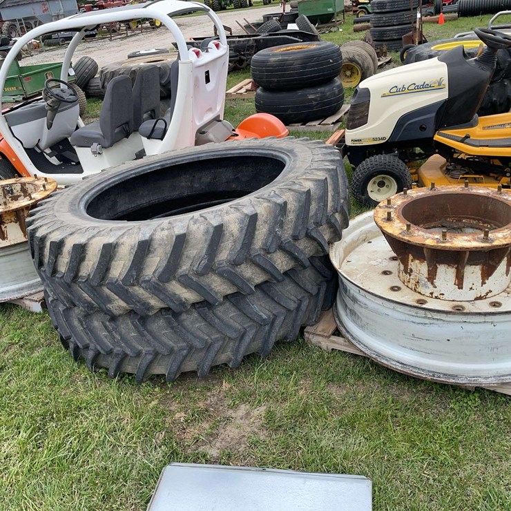 Two 380/90/46 spare tires and rims