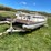 #2103-•-1990-kennedy-24'-supreme-pontoon-and-trailer-(has-wi-title)-image-1