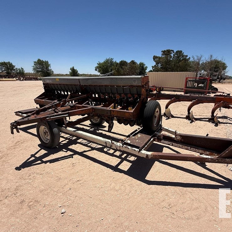 GRASS DRILL WITH TRAILER 5195