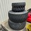 set-of-front-tires-and-rear-jd-turf-tires-27x8.5-15-front-tires-and-44x18.00-20-image-1