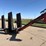 driver-over-hopper-with-unload-auger-image-3