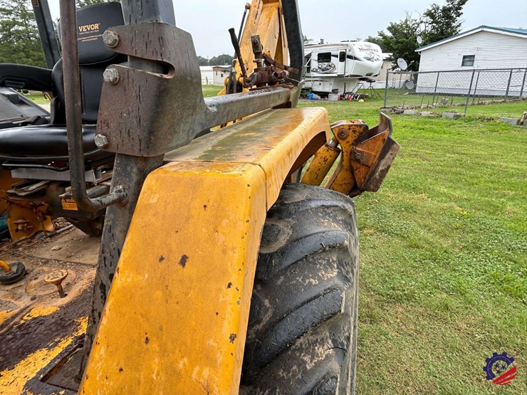 1989-john-deere-310-image-34