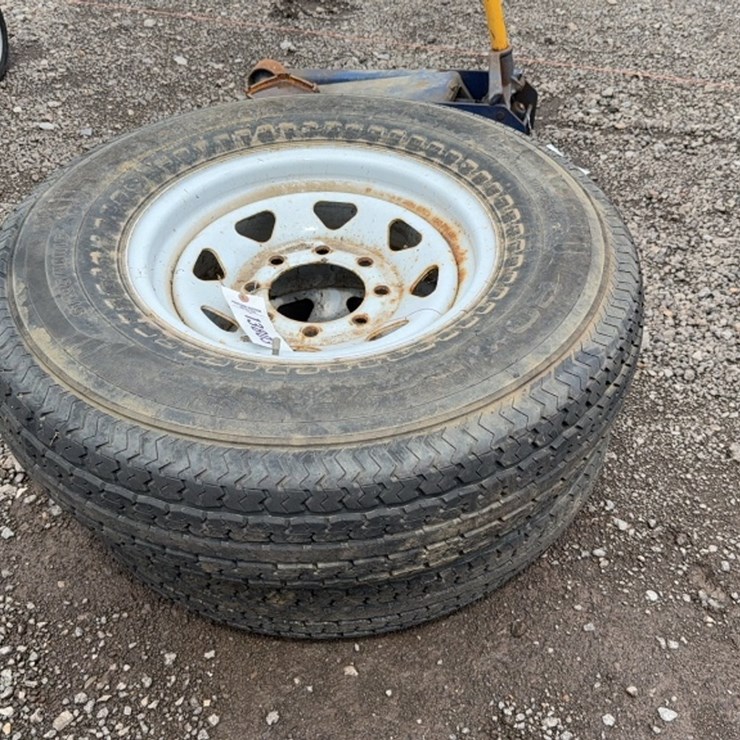 #6097 • QTY(2) 235/80 R16 TRAILER TIRES ON 8 LUG WHEELS