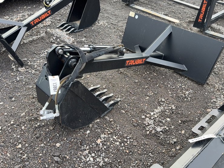 #2069-•-skid-steer-stationary-backhoe-w/12"-bucket-image-1