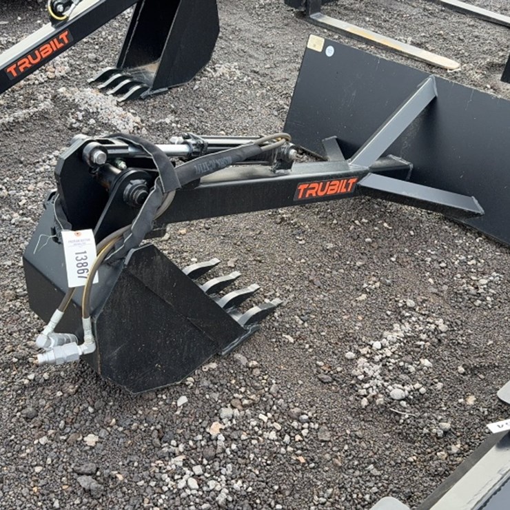 #2069 • SKID STEER STATIONARY BACKHOE W/12" BUCKET