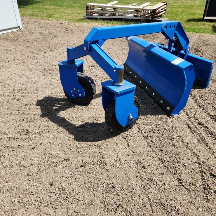 #351 • Skid steer grader