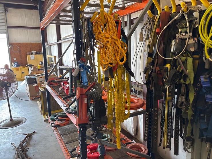 #4098-•-rack-of-climbing-safety-harnesses-image-7