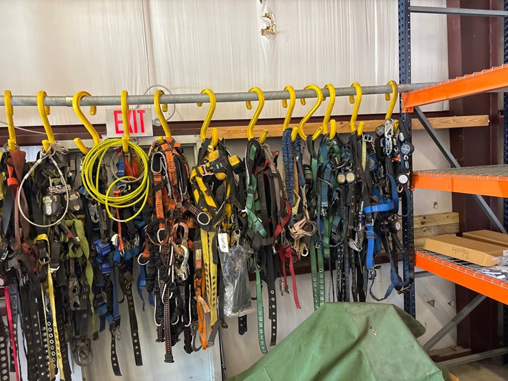 #4098-•-rack-of-climbing-safety-harnesses-image-3