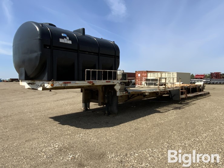2001-fontaine-dft-5-8048wsaw-tri/a-drop-deck-sprayer-tender-trailer-w/3200-gal-tank-image-1