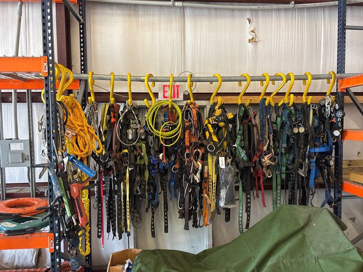 #4098-•-rack-of-climbing-safety-harnesses-image-2