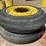 pair-of-12.4-30-single-rib-tires-on-8-hole-wheels-image-1