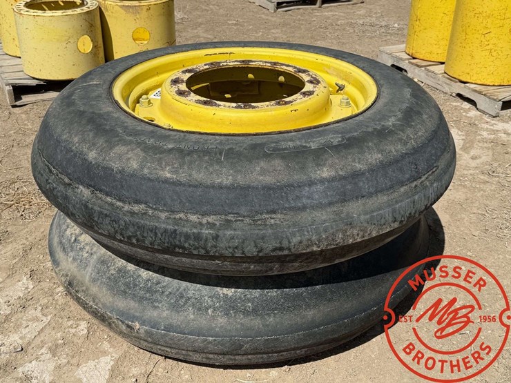pair-of-12.4-30-single-rib-tires-on-8-hole-wheels-image-1
