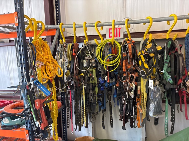 #4098-•-rack-of-climbing-safety-harnesses-image-4