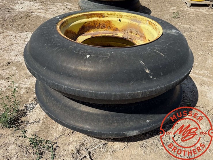 pair-of-12.4-30-single-rib-tires-on-wheels-image-1
