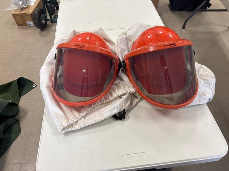 #4023-•-two-honeywell-helmets-in-bags-image-1