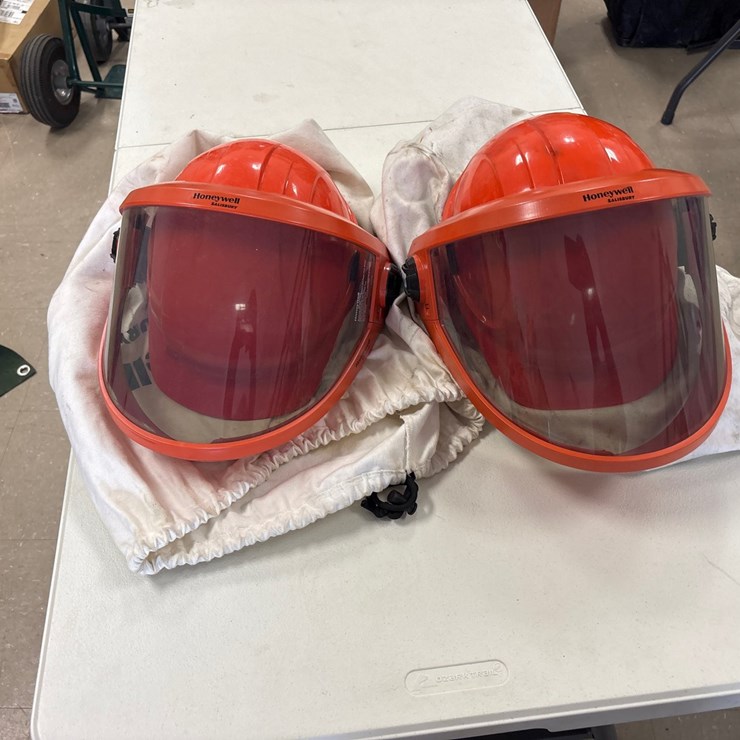 #4023 • TWO HONEYWELL HELMETS IN BAGS