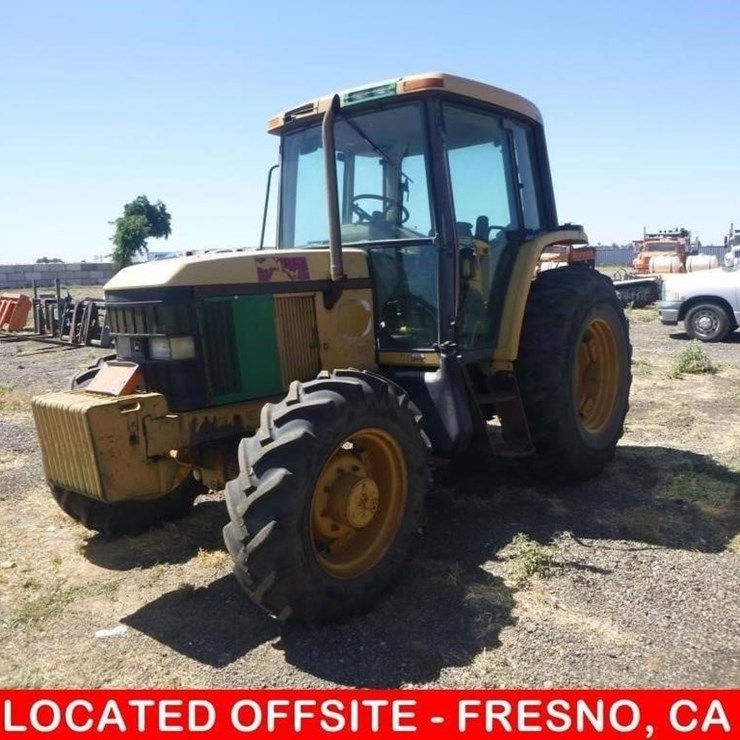 1999 JOHN DEERE 6410