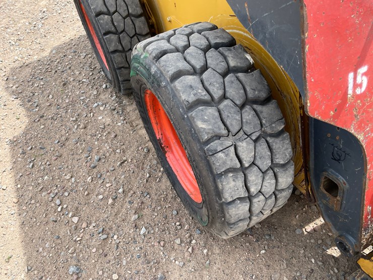 #1087-•-john-deere-319gr-skid-steer-image-5
