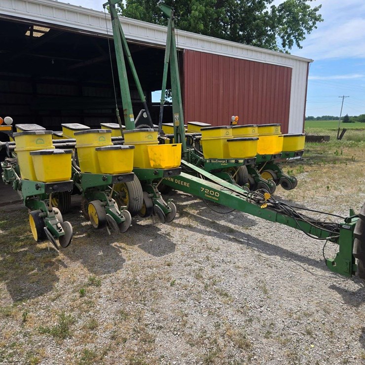 John Deere 7200 planter, 12-row, 30-inch MaxEmerge, with no-till coulters, corn plates updated for all seed sizes, bean plates, and a JD 250 monitor. It is in excellent condition, has been shed-kept, and was used only for beans in recent years. (Planter belongs to neighbor: 217-621-5441)