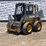 2015-deere-320e-image-1