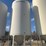 meridian-5000-bushel-hopper-bin-with-fan,-this-bin-is-designed-for-fertalizer,-however-it-has-never-had-fertilizer-in-it.-grain-only.-excellent-condition-image-3