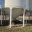 meridian-5000-bushel-hopper-bin-with-fan,-this-bin-is-designed-for-fertalizer,-however-it-has-never-had-fertilizer-in-it.-grain-only.-excellent-condition-image-5