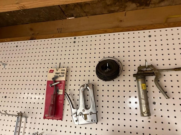 contents-of-wall.-cords,-stapler,-grease-gun-etc-image-4