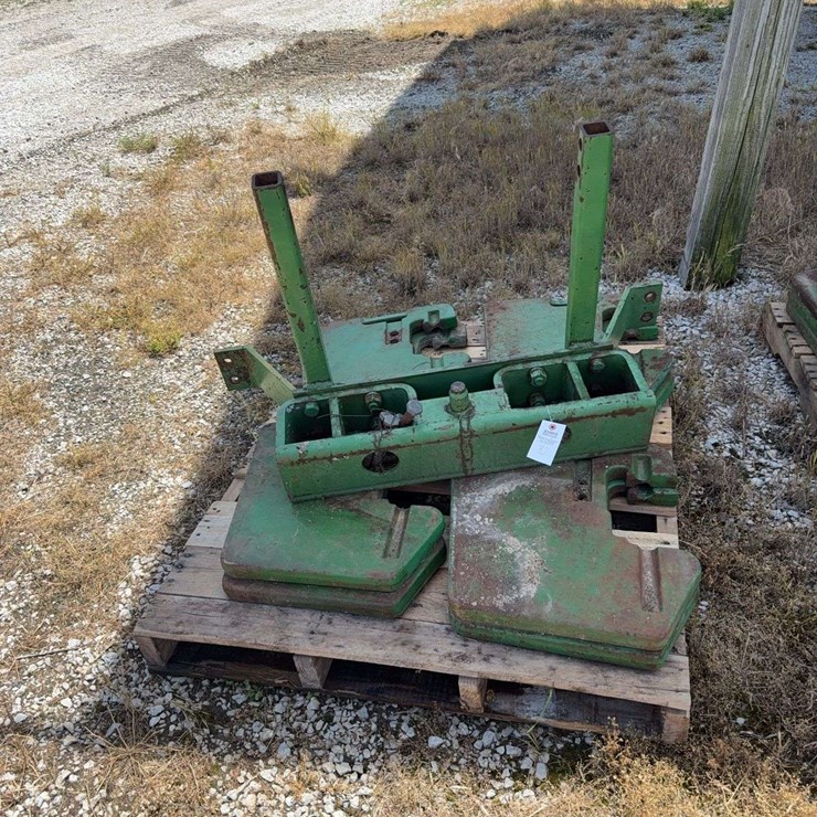 8 John Deere Suitcase weights and bracket (one money bid)