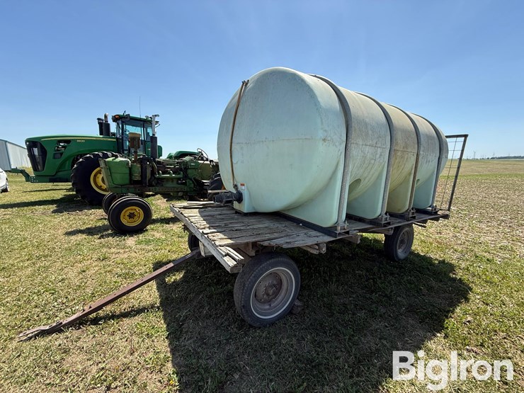 nurse-trailer-hayrack-w/-2,550-gal-poly-water-tank-image-1