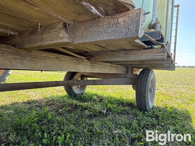 nurse-trailer-hayrack-w/-2,550-gal-poly-water-tank-image-19