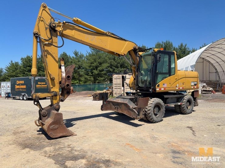 2003-caterpillar-m318c-image-1