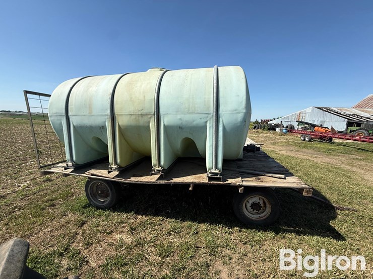 nurse-trailer-hayrack-w/-2,550-gal-poly-water-tank-image-4