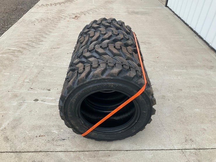 #4050-•-unused-set-of-skid-steer-tires-image-1