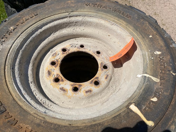 #7067-•-(4)-12-16.5-skid-steer-tires-on-rims-(deerbrook,-wi)-image-7