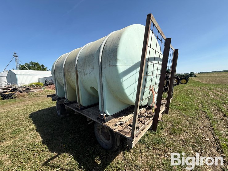 nurse-trailer-hayrack-w/-2,550-gal-poly-water-tank-image-7